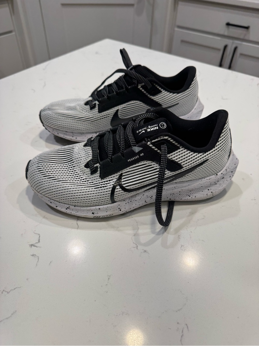 Nike Air Zoom Pegasus 40 running shoes in black and white womens size 8.5